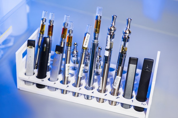a rack full of different e-cigarettes