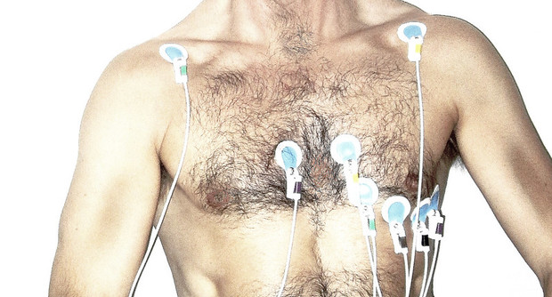 a man with electrodes on his chest