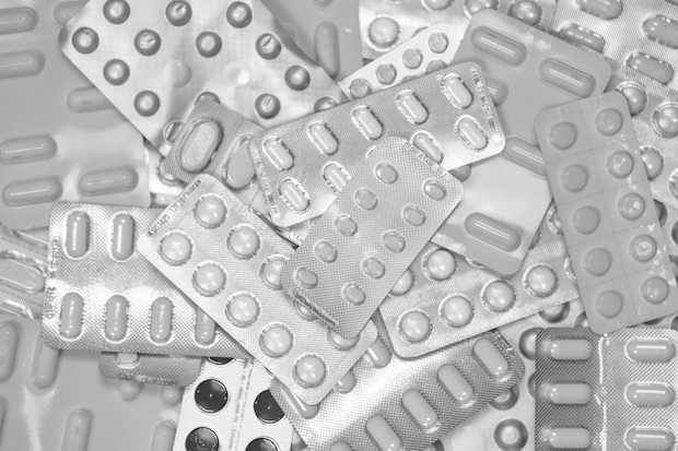 Black and white image of medication blister packs